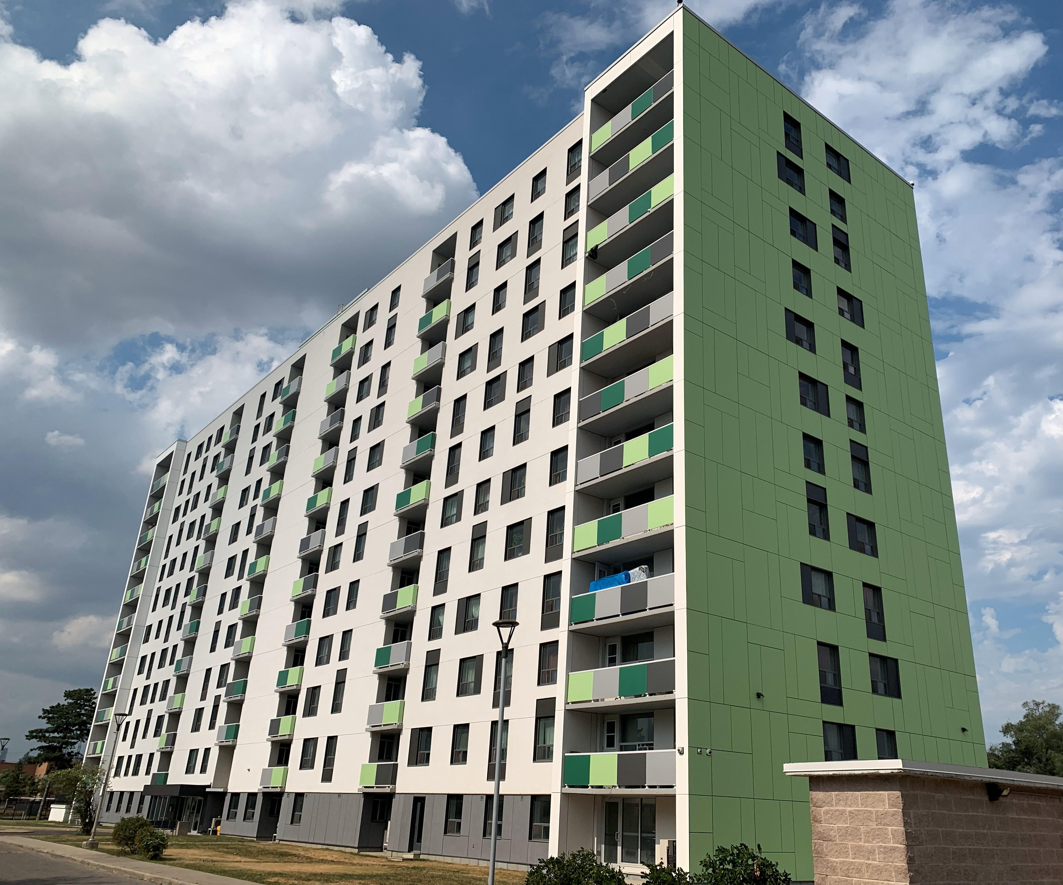 Modern building with green and white facade